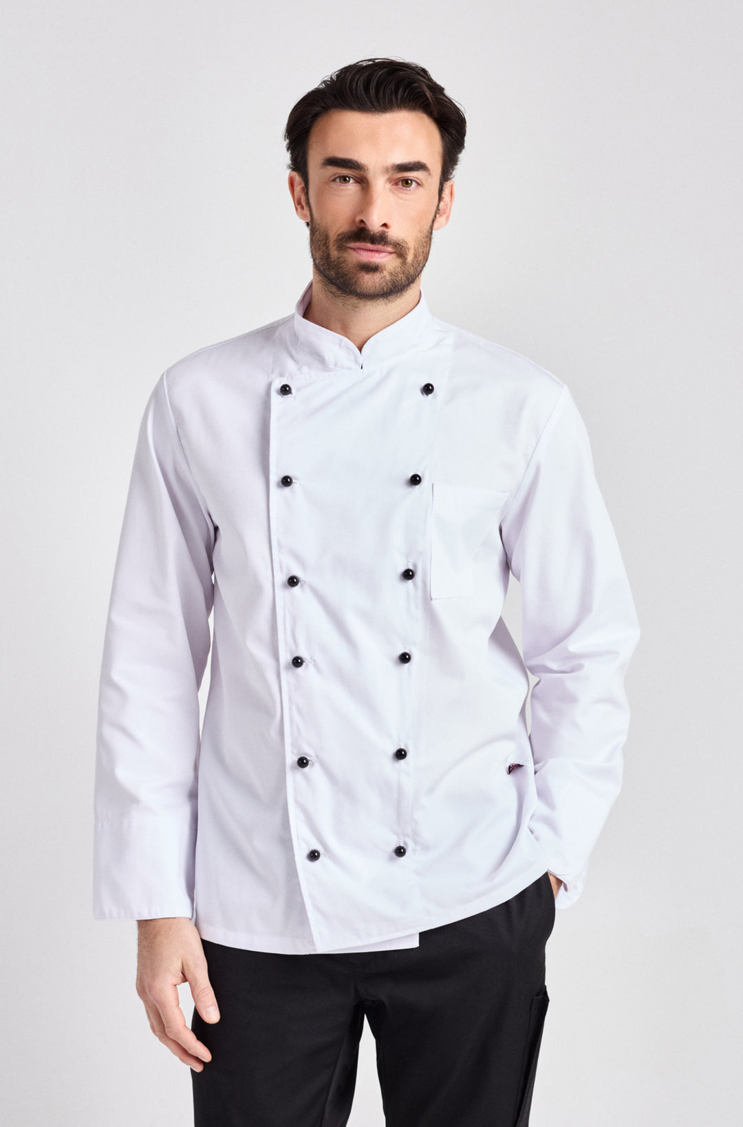 Klassische, weisse Kochjacke mit Kugelknöpfen. Modernes Material und angenehm zu tragen.